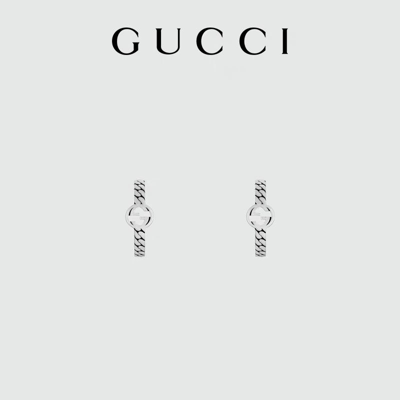 G*u*i earrings